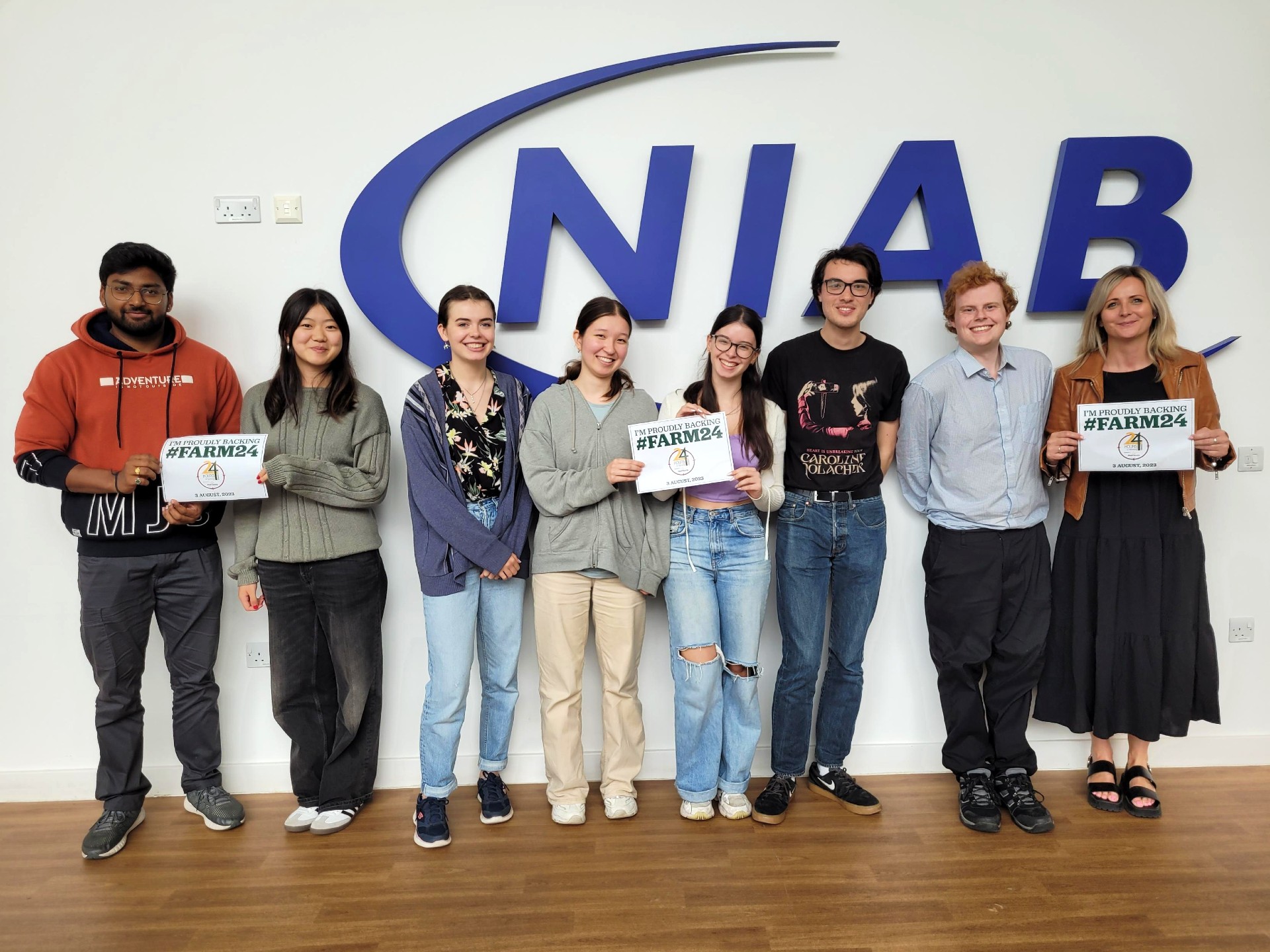 NIAB staff holding up banners supporting #Farm24