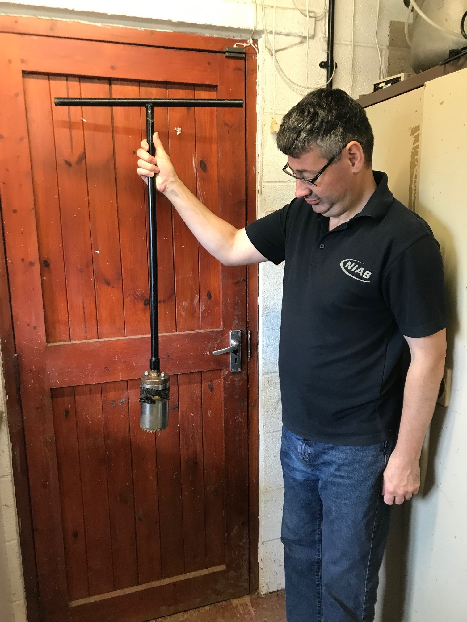 NIAB soil scientist evaluating a soil auger