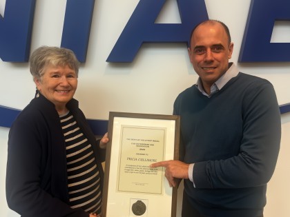 Tricia Cullimore receiving her award from NIAB CEO Mario Caccamo