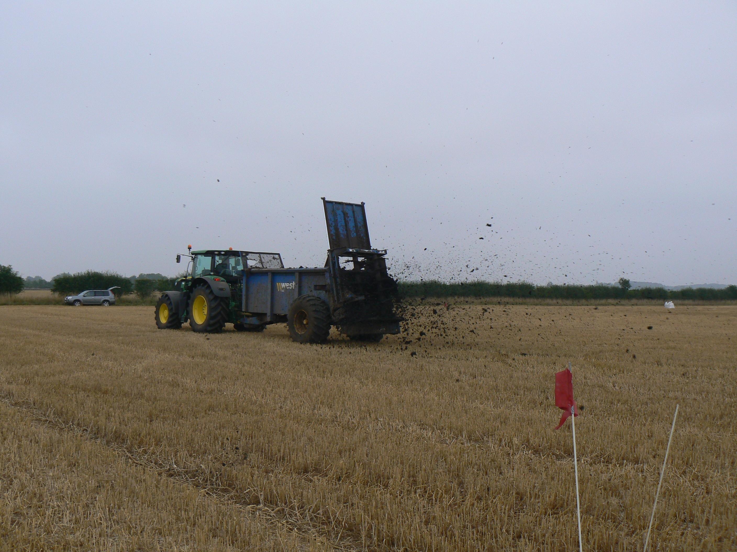 Spreading farmyard manure (FYM)