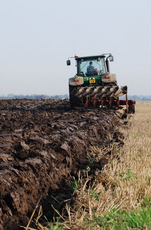 Tractor ploughing